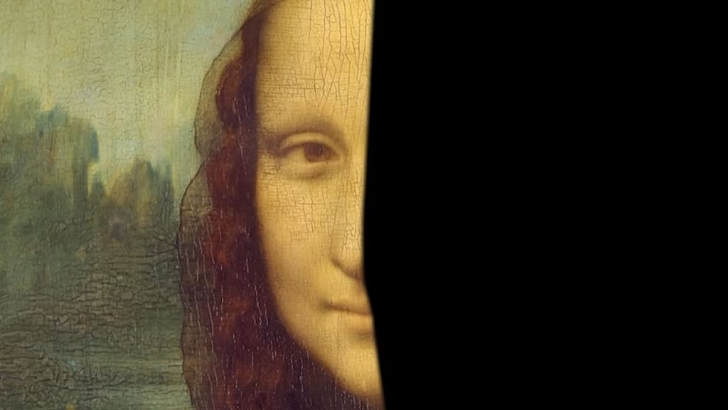 Cover the right half of her face with your hand. Look at just the left side