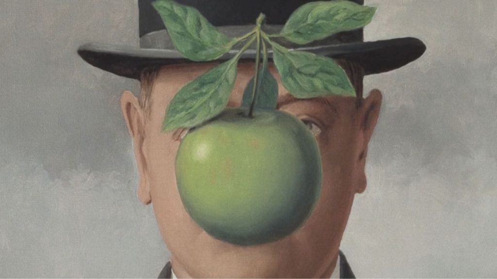 The green apple provides the only vibrant color in an otherwise muted palette of grays, browns, and blues.